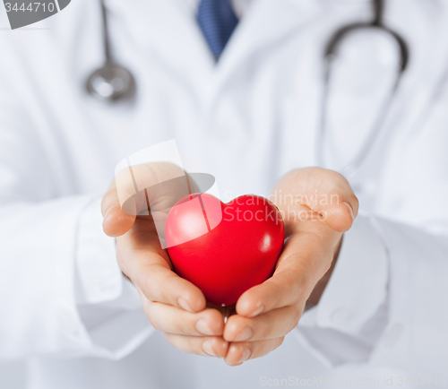 Image of man hands with heart