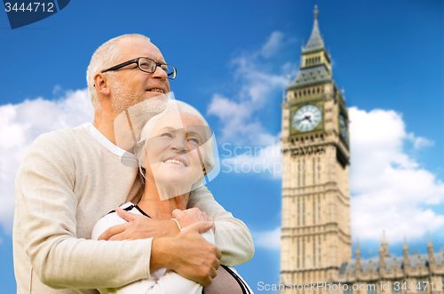 Image of happy senior couple over big ben tower in london