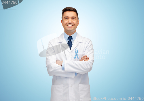 Image of happy doctor with prostate cancer awareness ribbon