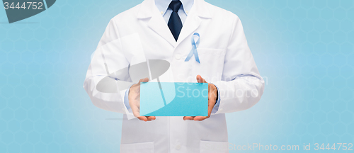 Image of doctor with prostate cancer awareness ribbon