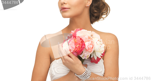 Image of woman with bouquet of flowers