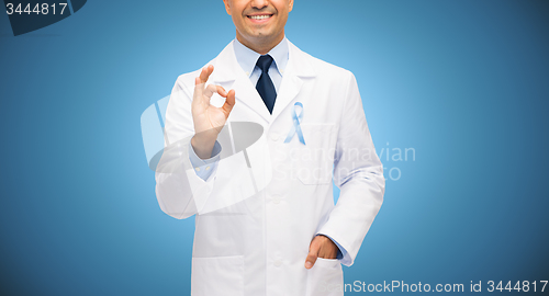 Image of happy doctor with prostate cancer awareness ribbon