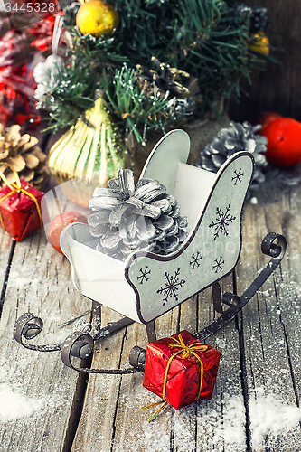 Image of Christmas card with sleigh and ornaments