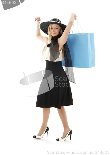Image of blond in retro hat with blue shopping bag #2