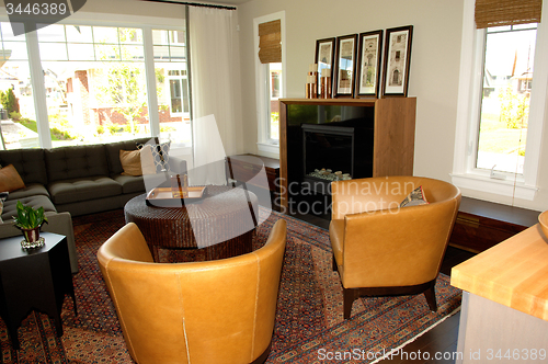 Image of Elegant living room whit chairs and windows.