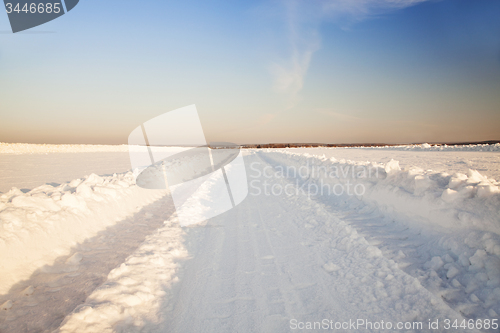 Image of road to a field. winter  