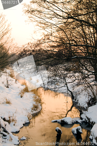 Image of Sunset above the small river