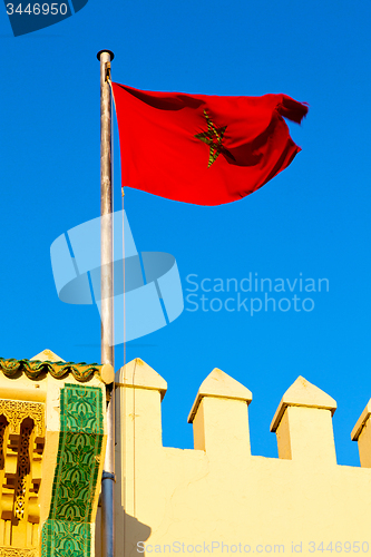 Image of tunisia  waving flag in the blue sky    battlements  wave