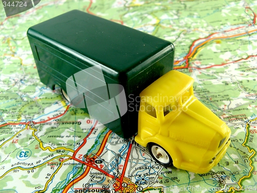 Image of yellow truck on a map