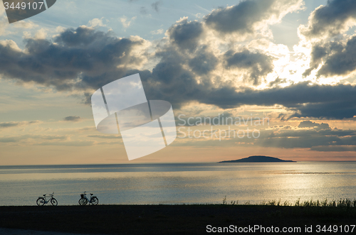 Image of Bike silhouettes by the coast