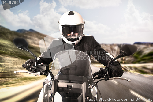 Image of Biker on the road