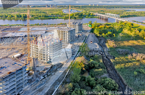 Image of View on construction site in Tyumen and Tura river