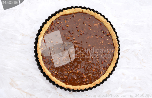 Image of Unbaked pecan pie ready for the oven 