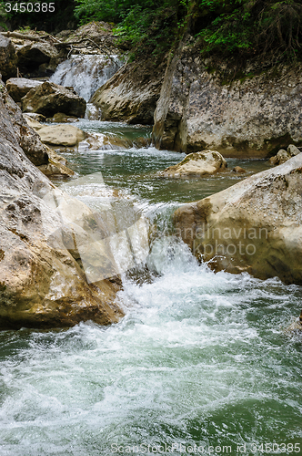 Image of Waterfall in forest at mountains