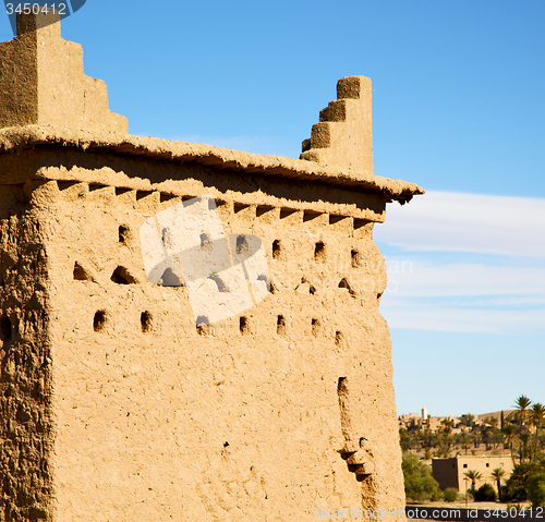 Image of brown old  construction in africa morocco and red leather near t