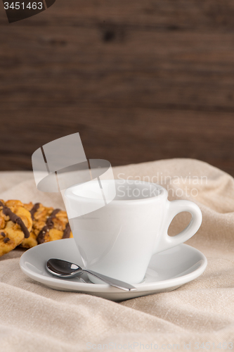 Image of White coffee cup with coffee