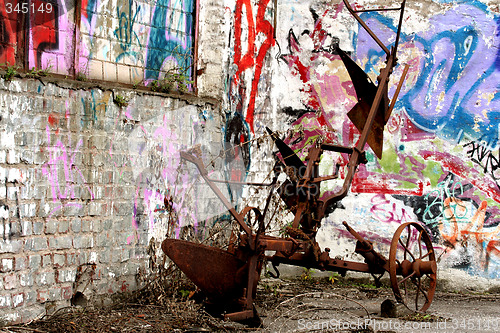 Image of graffiti with rusty tool