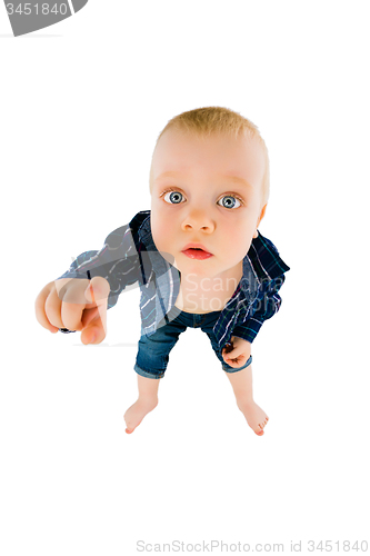 Image of little boy pointing her finger at the camera