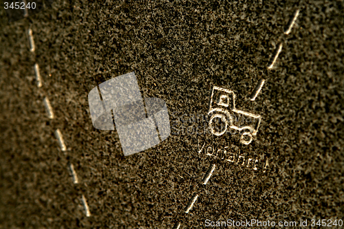 Image of tractor on stone