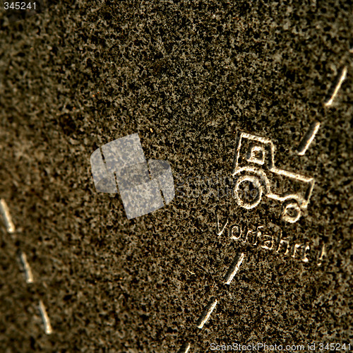 Image of tractor on stone