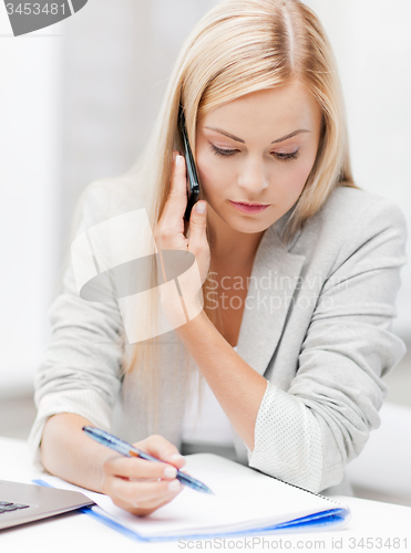 Image of businesswoman with phone