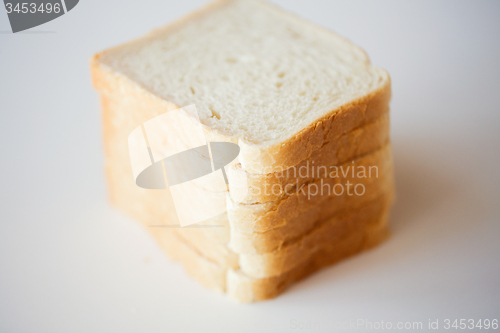 Image of close up of white toast bread on table