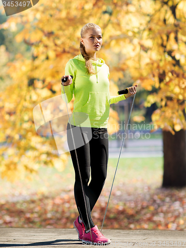 Image of woman doing sports outdoors