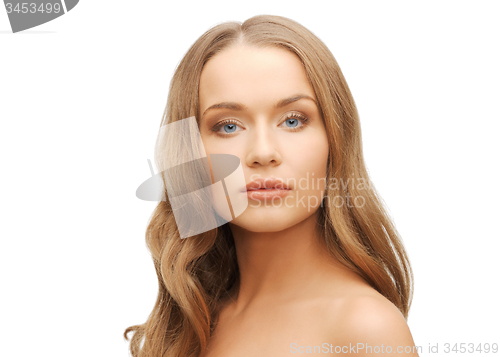 Image of beautiful woman face with long blond hair