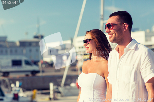 Image of smiling couple in city