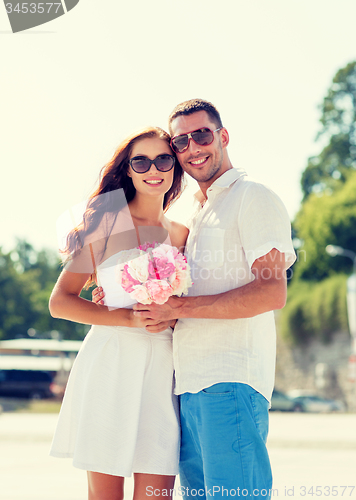 Image of smiling couple in city