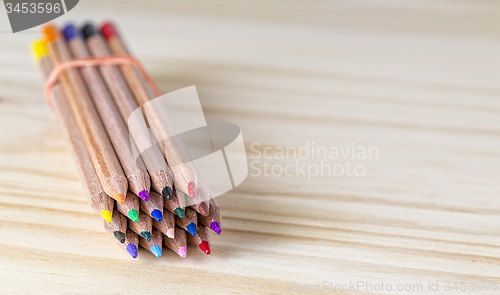 Image of Bundle of Pencils on a Wooden Table