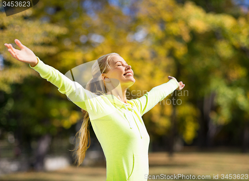 Image of woman doing sports outdoors