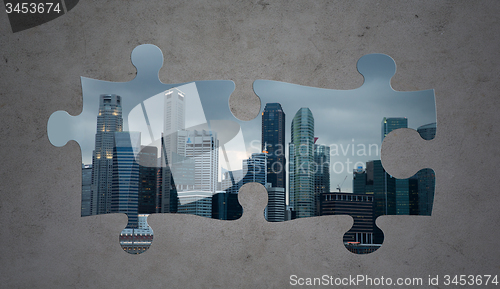 Image of puzzle of city over gray concrete background