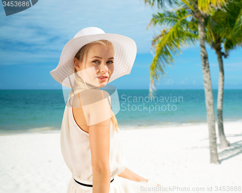 Image of beautiful woman enjoying summer outdoors