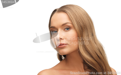 Image of beautiful woman face with long blond hair