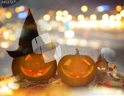 Image of close up of carved halloween pumpkins on table