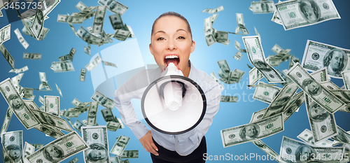 Image of screaming businesswoman with megaphone and money