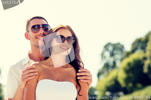 Image of smiling couple in city