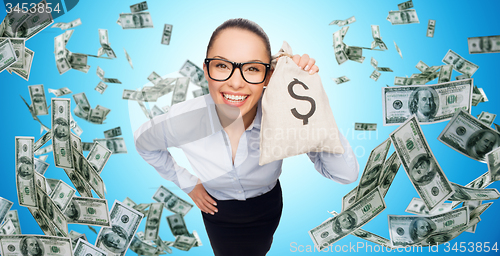 Image of smiling businesswoman with dollar cash money