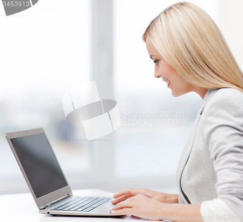 Image of businesswoman with laptop