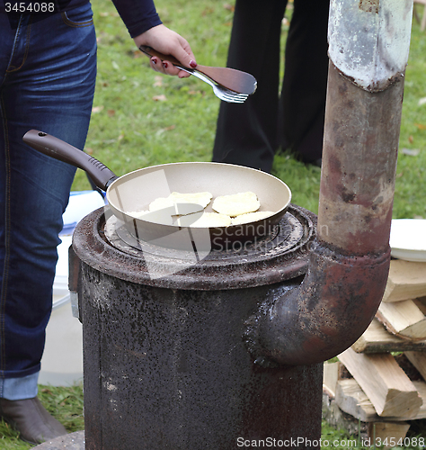 Image of Frying pancakes 