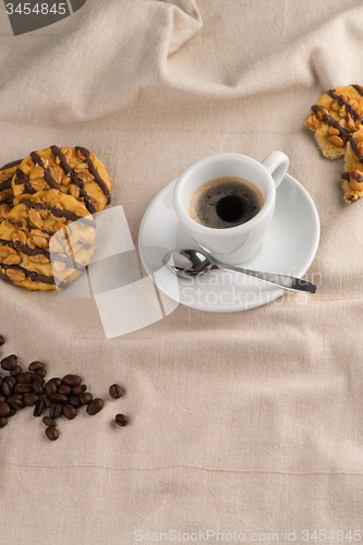 Image of White coffee cup with coffee
