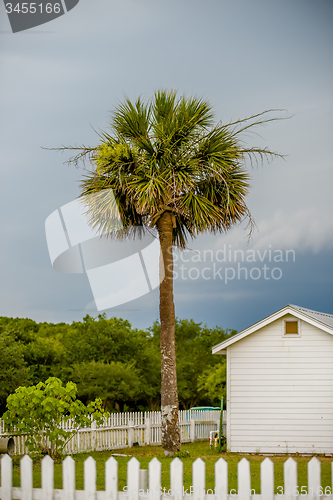 Image of Tybee Island Light with storm approaching