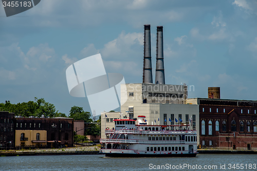 Image of ferry floating on river in savannah georgia usa