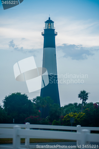 Image of Tybee Island Light with storm approaching