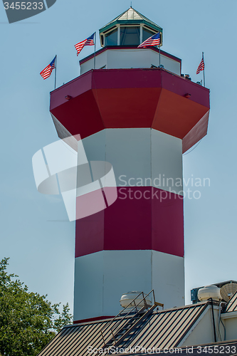 Image of A clear blue sky features the Harbour Town Lighthouse - famous l