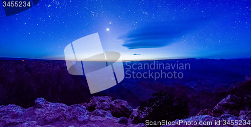 Image of grand canyon under moon and star light