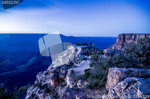 Image of grand canyon under moon and star light