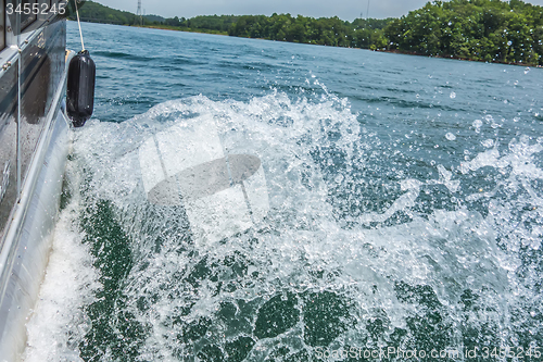 Image of Waves on lake behind the speed boat  