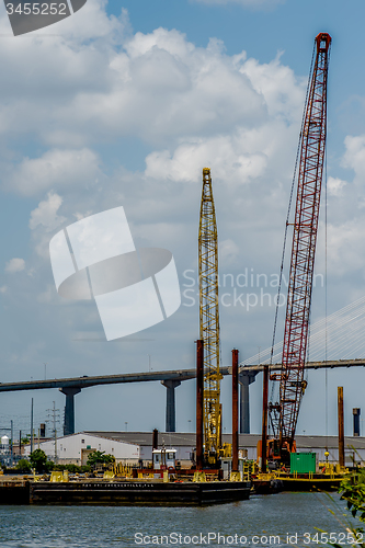 Image of construction boats on the river